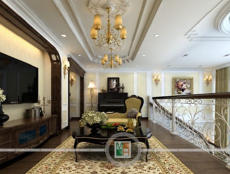 Mẫu thiết kế bàn trà đẹp với kiểu dáng hình bầu dục màu đen kèm hoa tiết tinh tế mang đến điểm nhấn cho căn phòng khách.